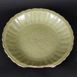 LARGE CHINESE MING DYNASTY (1368-1626) CELADON LONGQUAN DISH. With a wide fluted border and