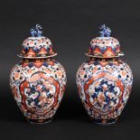 PAIR OF JAPANESE IMARI LIDDED JARS. Late 19thc, a pair of imari lidded jars with lion finials.