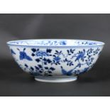 CHINESE BLUE & WHITE PORCELAIN BOWL. Late 19thc, the exterior painted with birds, butterflies and