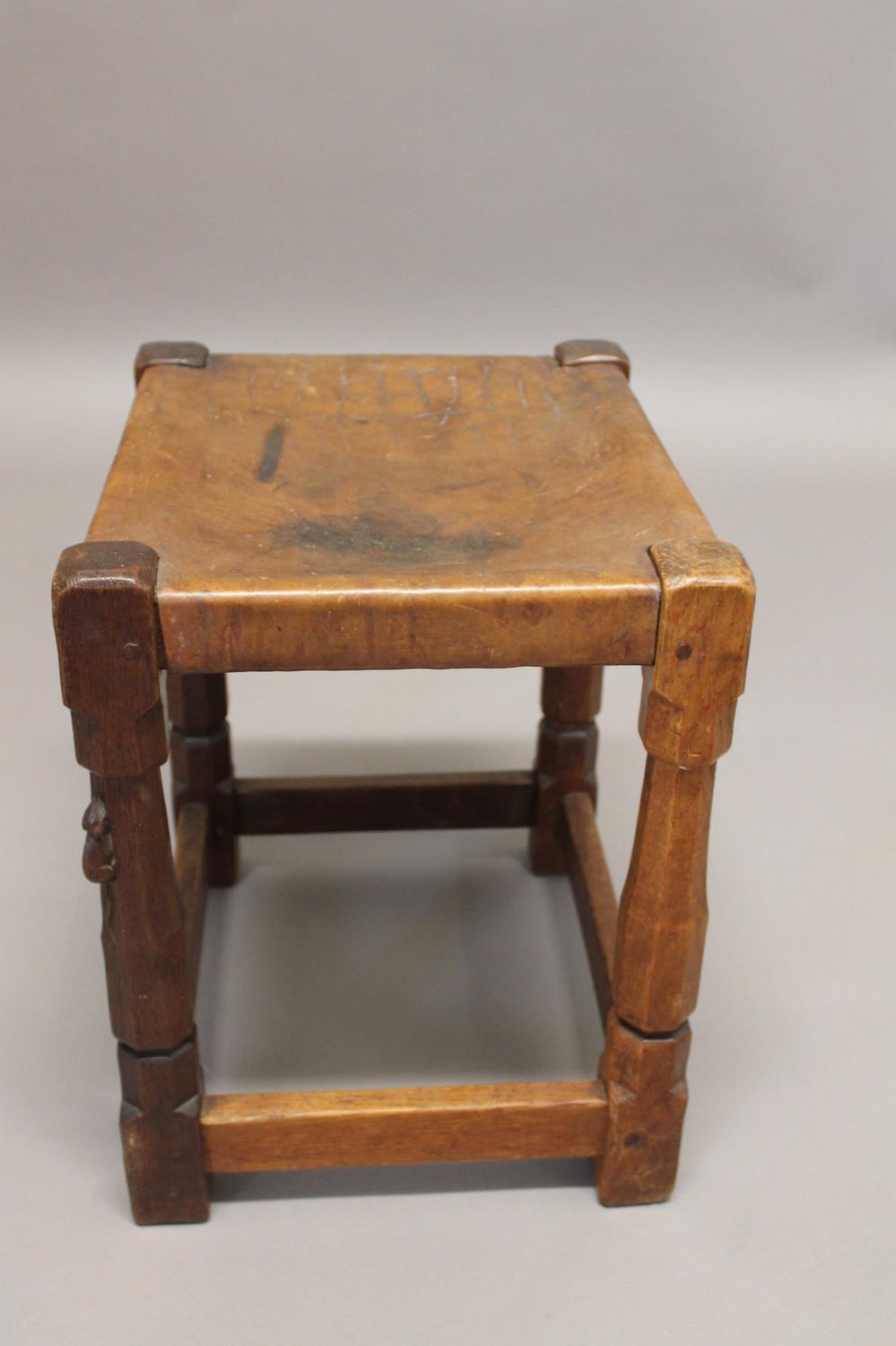 ROBERT THOMPSON OF KILBURN - EARLY MOUSEMAN STOOL. An oak stool with a solid leather seat and - Bild 7 aus 12