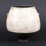 JASON WASON (B 1946) - LUGGED VASE. (d) The pottery vase with a smooth white top section with lugs