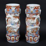 A PAIR OF JAPANESE PORCELAIN STICK STANDS. Probably late 19thc/early 20thc, a pair of cylindrical