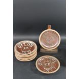 MUCHELNEY POTTERY - SET OF NINE PLATES, 1974. A set of nine stoneware plates (23cms diameter),