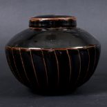 DAVID LEACH (1911-2005) - LIDDED STONEWARE JAR. (d) A lidded stoneware jar with fluted body and