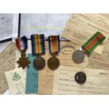 A GROUP OF FOUR AND SILVER WAR BADGE TO THE SHERWOOD FORESTERS.