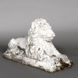 A WHITE PAINTED RECONSTITUTED STONE LION.