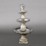A THREE TIER STONE WATER FOUNTAIN.
