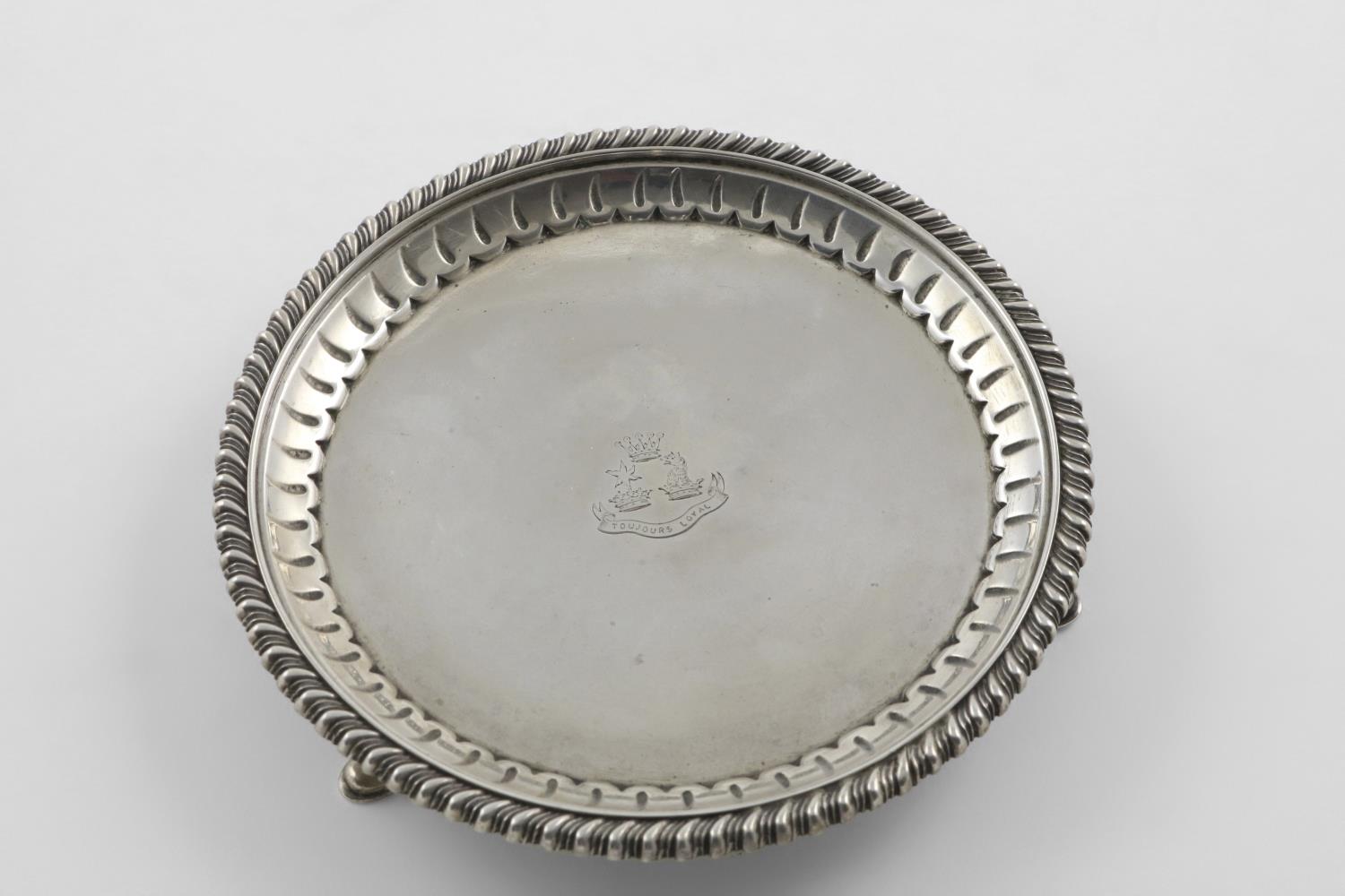 AN EDWARDIAN WAITER. of circular outline, with a gadrooned border, engraved in the centre with a