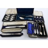 MISCELLANEOUS CASED SETS:-. a German three-piece travelling set, a cased set of 6 grapefruit spoons,