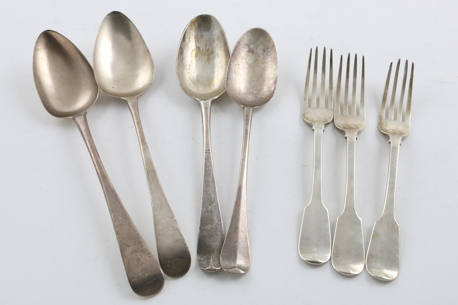 MISCELLANEOUS FLATWARE:-. a set of three York-made Fiddle Pattern forks, crested, by James Barber,