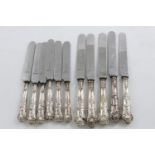 A SET OF FIVE VICTORIAN TABLE KNIVES AND SIX MATCHING SIDE KNIVES. of a decorative pattern, with