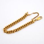 A 22CT GOLD CURB LINK BRACELET. 15cm long, 44.6 grams. **BP 22.5% inc VAT + Lot Fee of £8