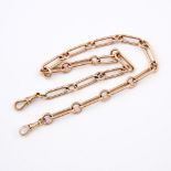 A 9CT GOLD WATCH CHAIN. formed with long oval and circular links, 40cm long, 42.2 grams. **BP 22.