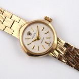 A LADY'S 9CT GOLD WRISTWATCH BY ROLEX. the signed circular dial with baton numerals, on an