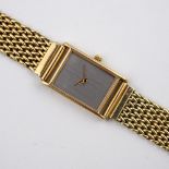 A LADY'S 14CT GOLD WRISTWATCH BY MILUS. with signed rectangular-shaped dial, on a 14ct gold mesh