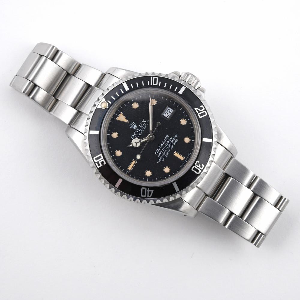 A GENTLEMAN'S STAINLESS STEEL OYSTER PERPETUAL SEA-DWELLER WRISTWATCH BY ROLEX. the black dial