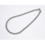 A 9CT WHITE GOLD NECKLACE. of brick link design, 42.5cm long, 33 grams. **BP 22.5% inc VAT + Lot Fee