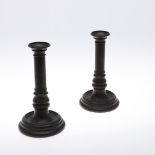 A PAIR OF VICTORIAN BRONZE CANDLESTICKS. each stamped 'VR' to the stem with serial numbers '185' and