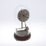 A BULLE PATENT ELECTRIC DOME CLOCK. the 5 3/4" silvered Roman numeral dial on a brass skeleton