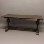 AN 18TH CENTURY OAK REFECTORY TABLE. of four plank construction with cleated ends, on bulbous