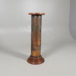 A BRONZE PEDESTAL OR PLANT STAND. possibly converted from a printing roller with heart and diamond