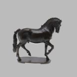 AFTER GIAMBOLOGNA (1529-1608). a patinated bronze study of The Pacing Horse on an oval base,