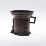 A BRONZE MORTAR. possibly German in the 16th century style, the flared rim above a cylindrical