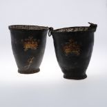 A PAIR OF EARLY 19TH CENTURY LEATHER FIRE BUCKETS. with studded banding and painted coronets, height