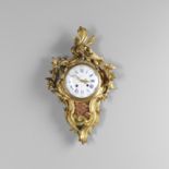 A 19TH CENTURY FRENCH ORMOLU CARTEL CLOCK. the 5 1/2" enamelled dial signed Bennett, Cheapside