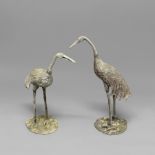 A PAIR OF LEAD STORKS. set on naturalistic bases, height 58cm. * Worn and weathered, possible