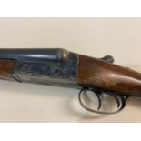 A 20 BORE AYA 20 BORE DOUBLE BARREL SHOTGUN.