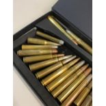 A COLLECTION OF NINETEEN INERT RIFLE CARTRIDGES.