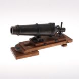 A MODEL OF A NINETEENTH CENTURY 68 POUNDER CARRONADE FROM HMS VICTORY'S FOC'SLE.