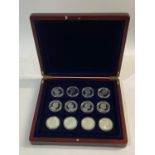 A SET OF TWENTY FOUR SILVER 'KINGS OF ENGLAND' COINS.