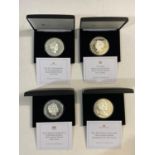 FOUR JUBILEE MINT SILVER PROOF 5oz PRESENTATION COINS.