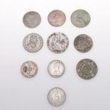 A SMALL COLLECTION OF GB AND WORLD SILVER COINS TO INCLUDE A 1944 HALFCROWN.