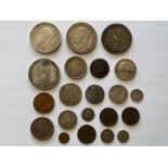 TWO GEORGE V 'ROCKING HORSE' CROWNS AND A SMALL COLLECTION OF WORLD COINS.