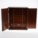 A VICTORIAN MAHOGANY COIN CABINET AND CONTENTS.