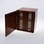 A LARGE VICTORIAN MAHOGANY COIN CABINET AND CONTENTS.