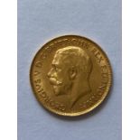 A GEORGE V HALF SOVEREIGN, 1913.