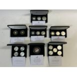 A COLLECTION OF JUBILEE MINT GOLD AND SILVER PROOF COIN SETS.