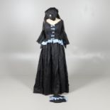 EARLY 20THC FULL LENGTH BLACK TAFETTA COSTUME WITH BLUE DETAIL.