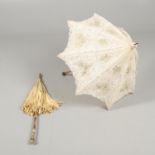 A LATE 19TH CENTURY LACE PARASOL & ANOTHER PARASOL.
