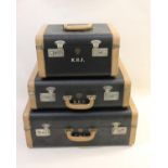 A SET OF THREE 1930'S BLACK & TAN LEATHER AMERICAN SUITCASES BY MCBRINE (AEROPACK).