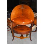 AN EARLY 20TH CENTURY MAHOGANY CORNER WASHSTAND, THE TOP WITH HIGH-BACKED GALLERY OVER SET OF TWO