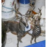 TWO SPELTER STAG TABLE ORNAMENTS, THE LARGER 30CM HIGH.