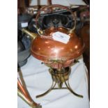 EARLY 20TH CENTURY COPPER AND BRASS KETTLE IN THE MANNER OF BENSON, OF CIRCULAR FORM ON A BRASS