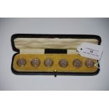 CASED SET OF SIX BIRMINGHAM SILVER CIRCULAR BUTTONS, WITH EMBOSSED DECORATION OF ART NOUVEAU