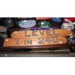 RAILWAYANA - A TWO SECTIONAL WOODEN SIGN COMPRISING CAST IRON LETTERS AND NUMBERS, LATER MOUNTED