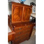 AN EDWARDIAN MAHOGANY AND SATINWOOD BANDED CABINET ON CHEST, UPPER SECTION WITH TWO OVAL PANELLED